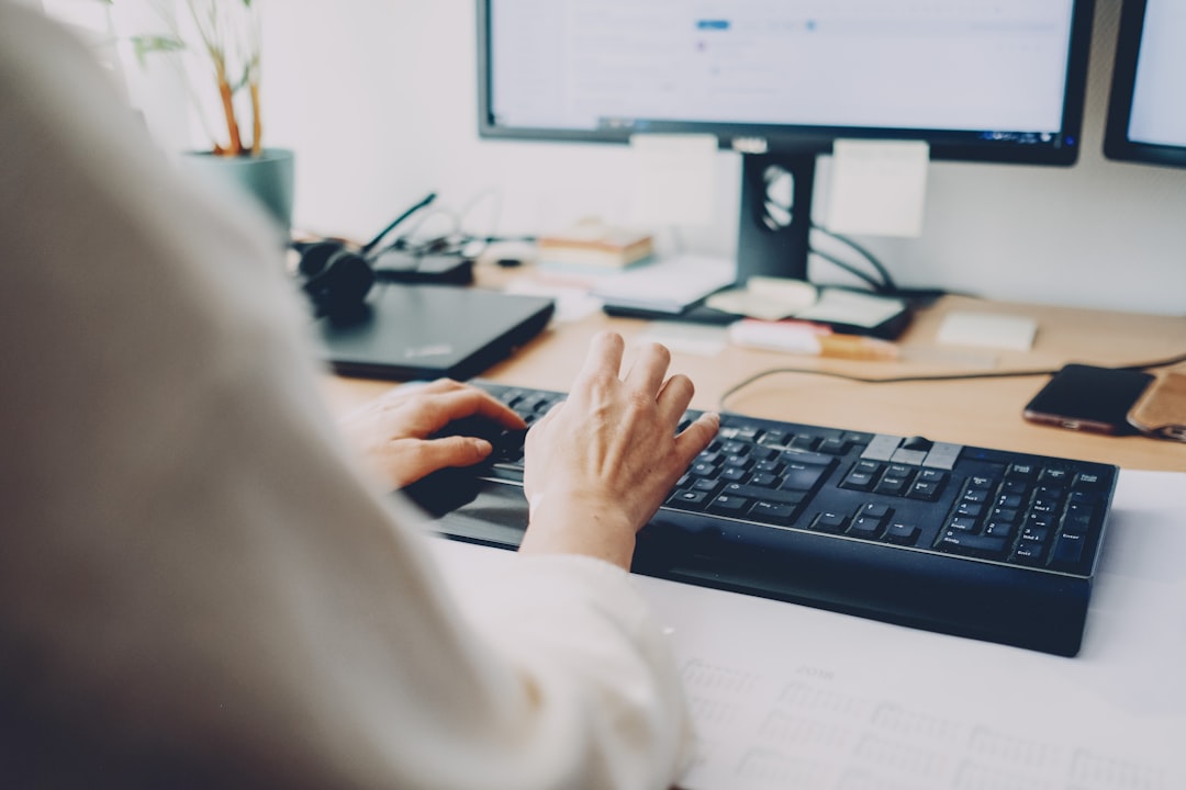 Accounting professional working securely at a computer
