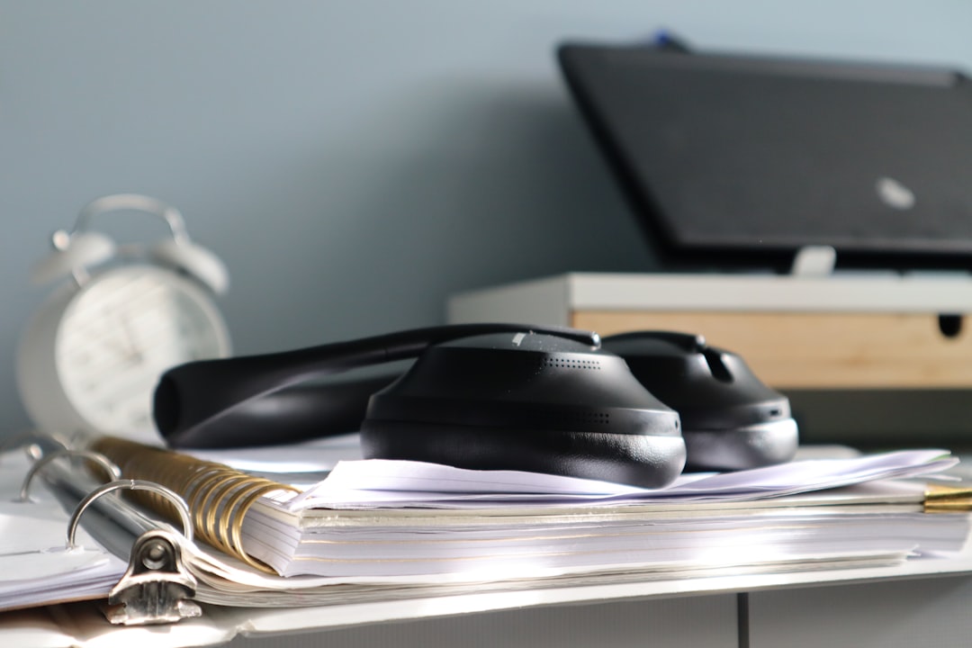 Professional legal office desk with laptop and phone