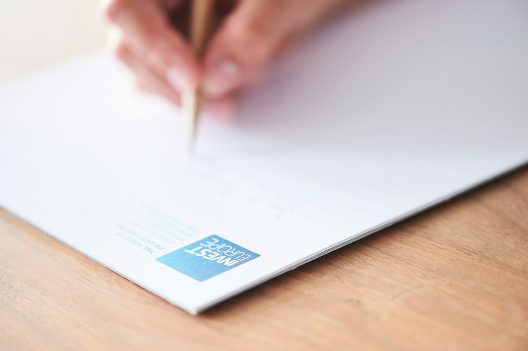 Professional reviewing and signing a business document