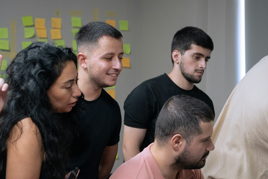 Nonprofit staff and volunteers collaborating around a conference table